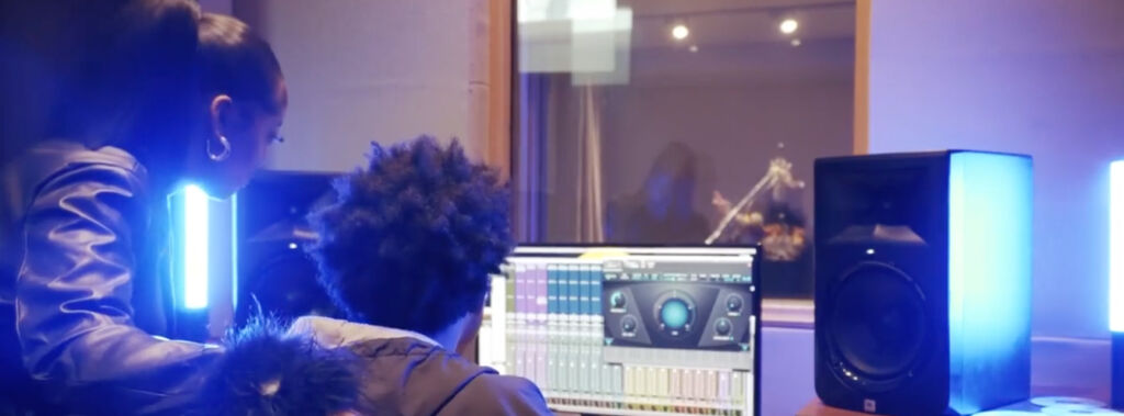 Kierstyn Alysse in the studio with engineer